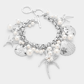 Pearl embellished starfish shell multi charm toggle bracelet