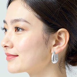 White Gold Dipped Sculptural Huggie Hoop Earrings